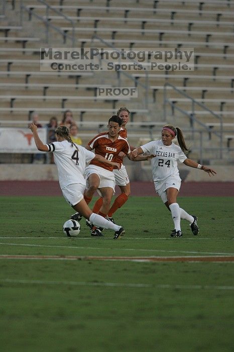 UT senior Stephanie Logterman (#10, Defender).  The University of Texas women's soccer team tied 0-0 against the Texas A&M Aggies Friday night, September 27, 2008.

Filename: SRM_20080926_1908506.jpg
Aperture: f/4.0
Shutter Speed: 1/1250
Body: Canon EOS-1D Mark II
Lens: Canon EF 300mm f/2.8 L IS