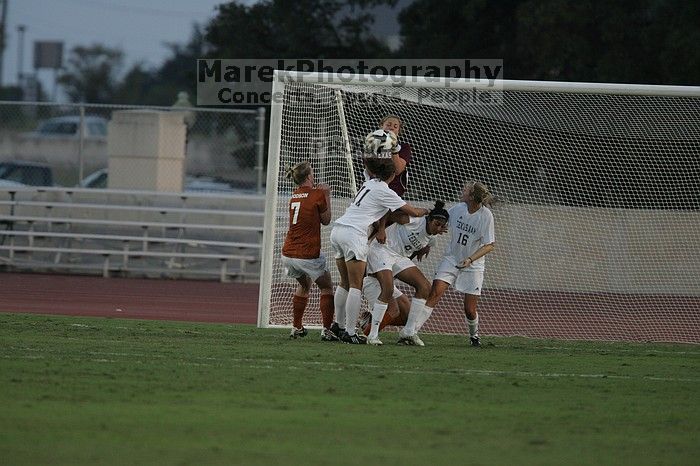 UT freshman Courtney Goodson (#7, Forward and Midfielder) loses the ball to the A&M goalkeeper.  The University of Texas women's soccer team tied 0-0 against the Texas A&M Aggies Friday night, September 27, 2008.

Filename: SRM_20080926_1909585.jpg
Aperture: f/4.0
Shutter Speed: 1/1000
Body: Canon EOS-1D Mark II
Lens: Canon EF 300mm f/2.8 L IS