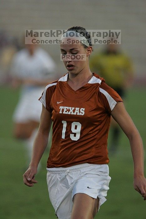 UT sophomore Erica Campanelli (#19, Defender).  The University of Texas women's soccer team tied 0-0 against the Texas A&M Aggies Friday night, September 27, 2008.

Filename: SRM_20080926_1912525.jpg
Aperture: f/4.0
Shutter Speed: 1/800
Body: Canon EOS-1D Mark II
Lens: Canon EF 300mm f/2.8 L IS