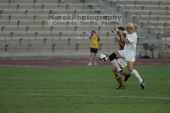 UT senior Courtney Gaines (#23, Midfielder).  The University of Texas women's soccer team tied 0-0 against the Texas A&M Aggies Friday night, September 27, 2008.

Filename: SRM_20080926_1914249.jpg
Aperture: f/4.0
Shutter Speed: 1/800
Body: Canon EOS-1D Mark II
Lens: Canon EF 300mm f/2.8 L IS