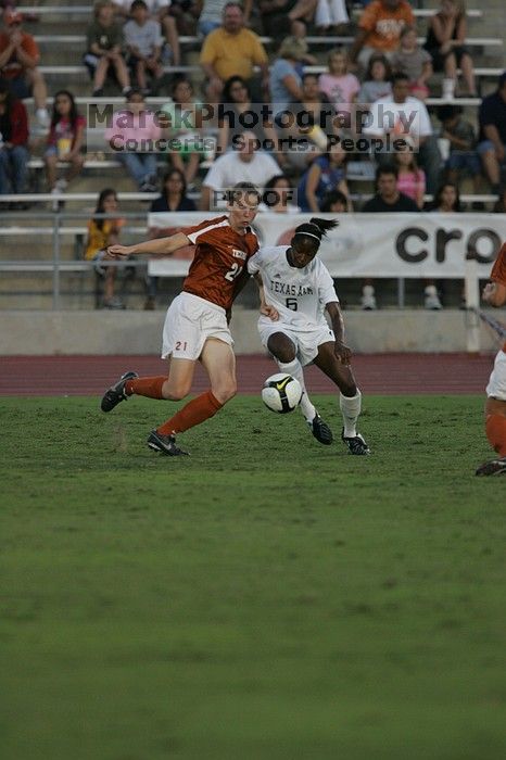 UT junior Emily Anderson (#21, Forward).  The University of Texas women's soccer team tied 0-0 against the Texas A&M Aggies Friday night, September 27, 2008.

Filename: SRM_20080926_1914384.jpg
Aperture: f/4.0
Shutter Speed: 1/800
Body: Canon EOS-1D Mark II
Lens: Canon EF 300mm f/2.8 L IS