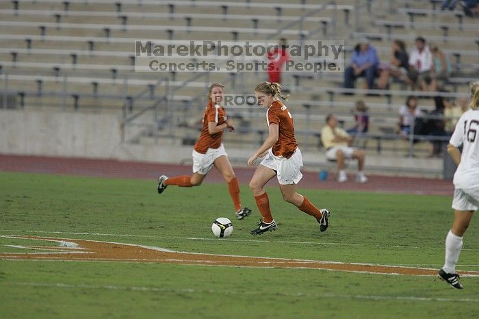 UT freshman Courtney Goodson (#7, Forward and Midfielder).  The University of Texas women's soccer team tied 0-0 against the Texas A&M Aggies Friday night, September 27, 2008.

Filename: SRM_20080926_1924181.jpg
Aperture: f/4.0
Shutter Speed: 1/400
Body: Canon EOS-1D Mark II
Lens: Canon EF 300mm f/2.8 L IS