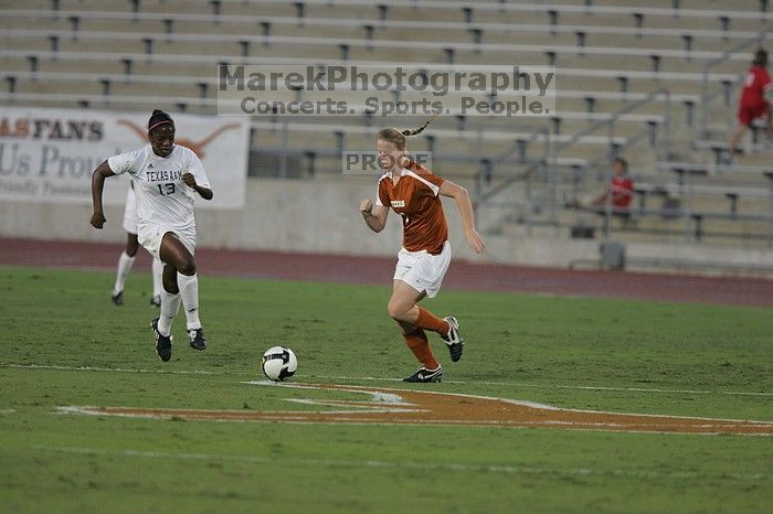 UT freshman Courtney Goodson (#7, Forward and Midfielder).  The University of Texas women's soccer team tied 0-0 against the Texas A&M Aggies Friday night, September 27, 2008.

Filename: SRM_20080926_1924202.jpg
Aperture: f/4.0
Shutter Speed: 1/500
Body: Canon EOS-1D Mark II
Lens: Canon EF 300mm f/2.8 L IS