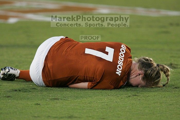 UT freshman Courtney Goodson (#7, Forward and Midfielder) lies on the field injured.  The University of Texas women's soccer team tied 0-0 against the Texas A&M Aggies Friday night, September 27, 2008.

Filename: SRM_20080926_1924385.jpg
Aperture: f/4.0
Shutter Speed: 1/320
Body: Canon EOS-1D Mark II
Lens: Canon EF 300mm f/2.8 L IS