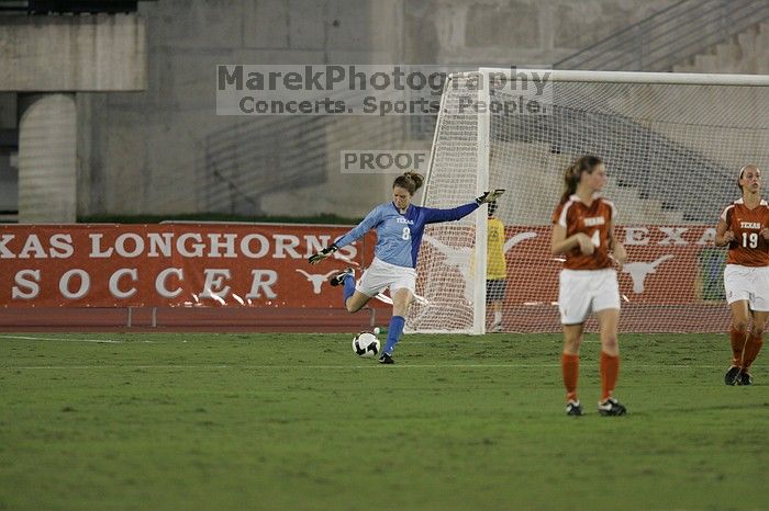 UT senior Dianna Pfenninger (#8, Goalkeeper) punts the ball downfield.  The University of Texas women's soccer team tied 0-0 against the Texas A&M Aggies Friday night, September 27, 2008.

Filename: SRM_20080926_1929089.jpg
Aperture: f/4.0
Shutter Speed: 1/400
Body: Canon EOS-1D Mark II
Lens: Canon EF 300mm f/2.8 L IS