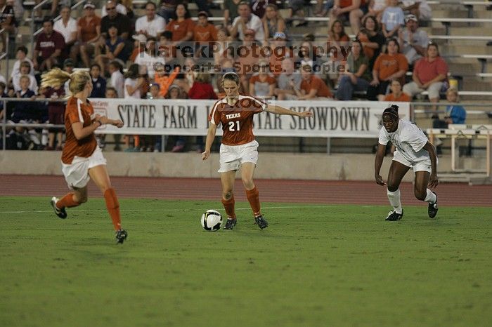 UT junior Emily Anderson (#21, Forward).  The University of Texas women's soccer team tied 0-0 against the Texas A&M Aggies Friday night, September 27, 2008.

Filename: SRM_20080926_1930264.jpg
Aperture: f/4.0
Shutter Speed: 1/400
Body: Canon EOS-1D Mark II
Lens: Canon EF 300mm f/2.8 L IS