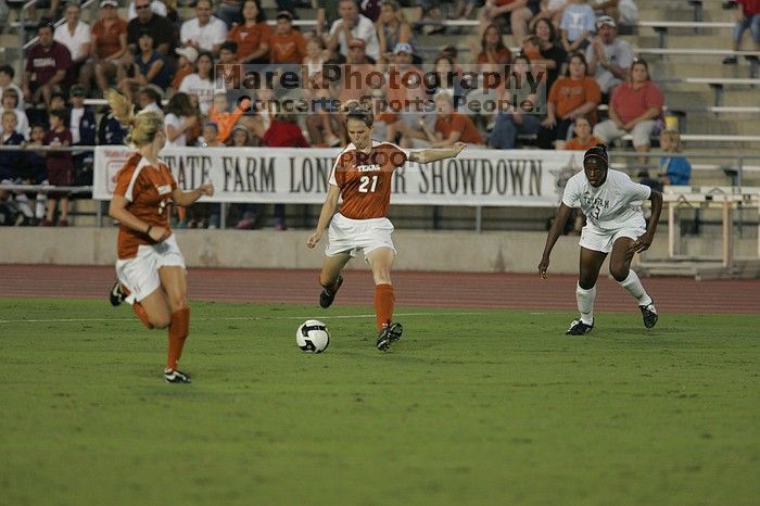 UT junior Emily Anderson (#21, Forward).  The University of Texas women's soccer team tied 0-0 against the Texas A&M Aggies Friday night, September 27, 2008.

Filename: SRM_20080926_1930285.jpg
Aperture: f/4.0
Shutter Speed: 1/400
Body: Canon EOS-1D Mark II
Lens: Canon EF 300mm f/2.8 L IS