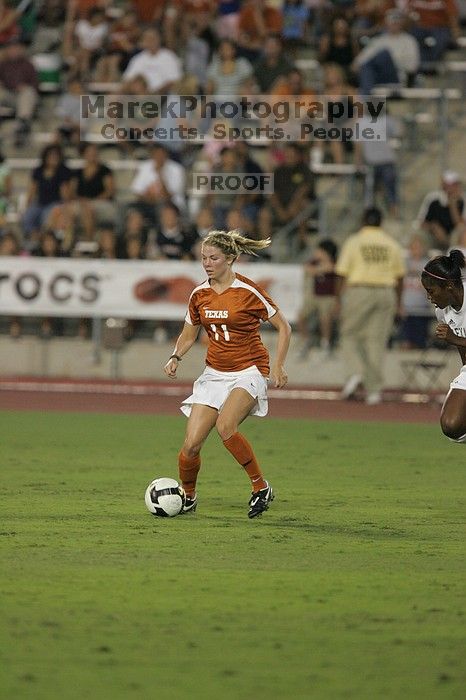 UT sophomore Niki Arlitt (#11, Forward).  The University of Texas women's soccer team tied 0-0 against the Texas A&M Aggies Friday night, September 27, 2008.

Filename: SRM_20080926_1936068.jpg
Aperture: f/4.0
Shutter Speed: 1/400
Body: Canon EOS-1D Mark II
Lens: Canon EF 300mm f/2.8 L IS