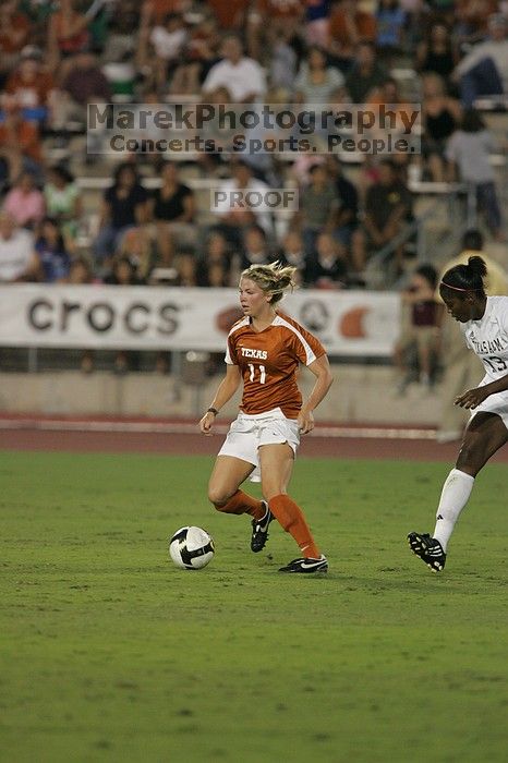 UT sophomore Niki Arlitt (#11, Forward).  The University of Texas women's soccer team tied 0-0 against the Texas A&M Aggies Friday night, September 27, 2008.

Filename: SRM_20080926_1936069.jpg
Aperture: f/4.0
Shutter Speed: 1/400
Body: Canon EOS-1D Mark II
Lens: Canon EF 300mm f/2.8 L IS