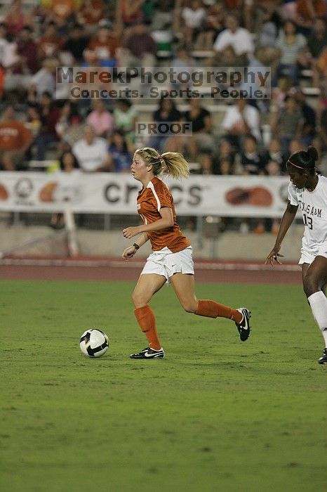 UT sophomore Niki Arlitt (#11, Forward).  The University of Texas women's soccer team tied 0-0 against the Texas A&M Aggies Friday night, September 27, 2008.

Filename: SRM_20080926_1936081.jpg
Aperture: f/4.0
Shutter Speed: 1/400
Body: Canon EOS-1D Mark II
Lens: Canon EF 300mm f/2.8 L IS