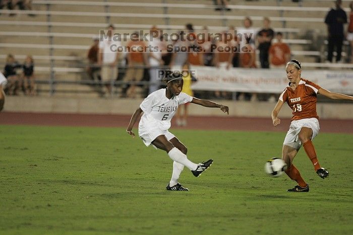 UT sophomore Erica Campanelli (#19, Defender).  The University of Texas women's soccer team tied 0-0 against the Texas A&M Aggies Friday night, September 27, 2008.

Filename: SRM_20080926_2006222.jpg
Aperture: f/2.8
Shutter Speed: 1/500
Body: Canon EOS-1D Mark II
Lens: Canon EF 300mm f/2.8 L IS