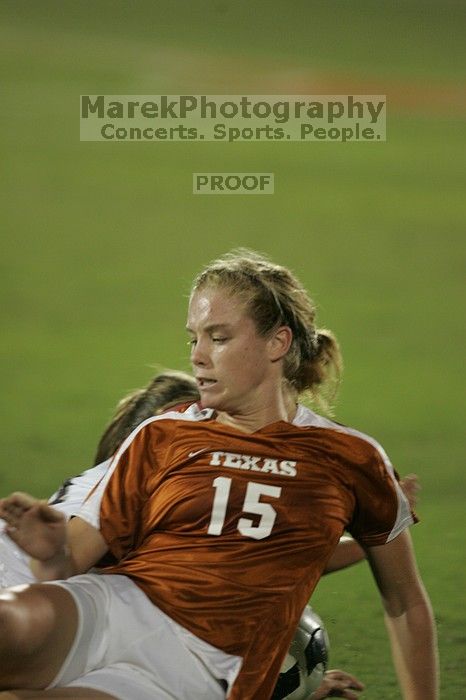 UT freshman Kylie Doniak (#15, Midfielder).  The University of Texas women's soccer team tied 0-0 against the Texas A&M Aggies Friday night, September 27, 2008.

Filename: SRM_20080926_2011046.jpg
Aperture: f/2.8
Shutter Speed: 1/500
Body: Canon EOS-1D Mark II
Lens: Canon EF 300mm f/2.8 L IS