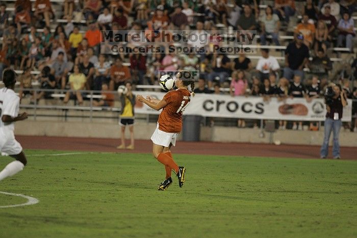 UT senior Kasey Moore (#14, Defender).  The University of Texas women's soccer team tied 0-0 against the Texas A&M Aggies Friday night, September 27, 2008.

Filename: SRM_20080926_2012289.jpg
Aperture: f/2.8
Shutter Speed: 1/500
Body: Canon EOS-1D Mark II
Lens: Canon EF 300mm f/2.8 L IS