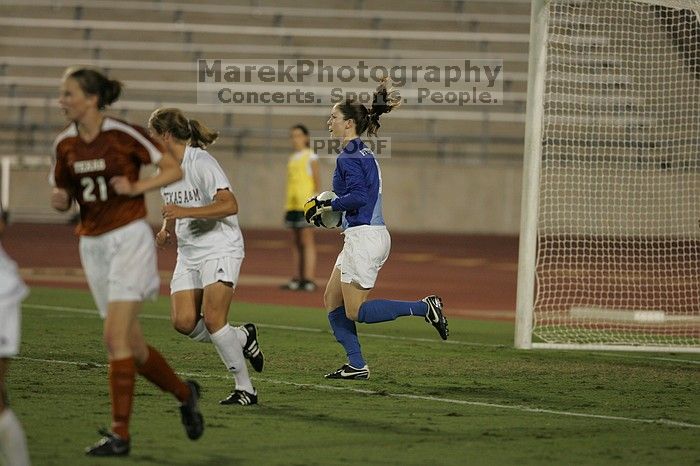 UT senior Dianna Pfenninger (#8, Goalkeeper).  The University of Texas women's soccer team tied 0-0 against the Texas A&M Aggies Friday night, September 27, 2008.

Filename: SRM_20080926_2029208.jpg
Aperture: f/2.8
Shutter Speed: 1/640
Body: Canon EOS-1D Mark II
Lens: Canon EF 300mm f/2.8 L IS