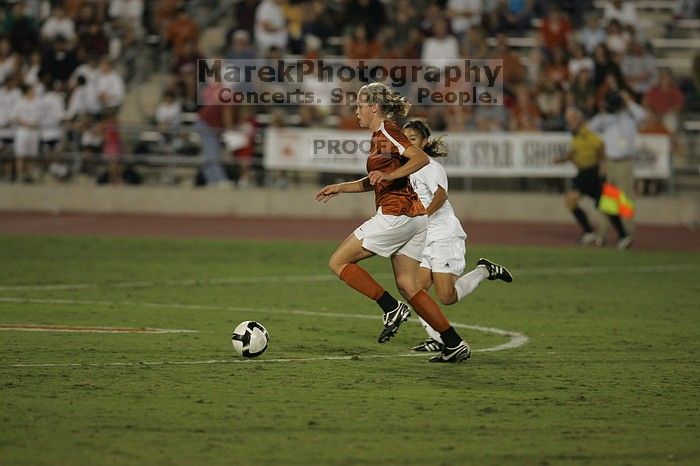 UT freshman Kylie Doniak (#15, Midfielder).  The University of Texas women's soccer team tied 0-0 against the Texas A&M Aggies Friday night, September 27, 2008.

Filename: SRM_20080926_2031462.jpg
Aperture: f/2.8
Shutter Speed: 1/640
Body: Canon EOS-1D Mark II
Lens: Canon EF 300mm f/2.8 L IS