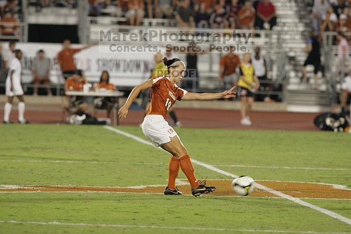 UT sophomore Erica Campanelli (#19, Defender) kicking the ball.  The University of Texas women's soccer team tied 0-0 against the Texas A&M Aggies Friday night, September 27, 2008.

Filename: SRM_20080926_2035562.jpg
Aperture: f/4.0
Shutter Speed: 1/200
Body: Canon EOS-1D Mark II
Lens: Canon EF 300mm f/2.8 L IS