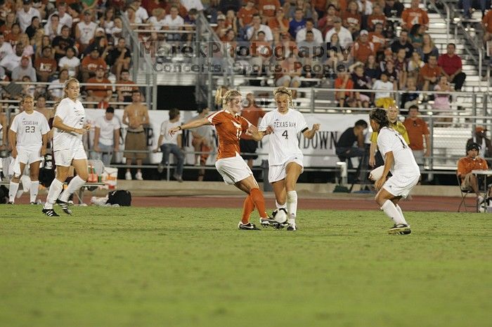 UT sophomore Niki Arlitt (#11, Forward).  The University of Texas women's soccer team tied 0-0 against the Texas A&M Aggies Friday night, September 27, 2008.

Filename: SRM_20080926_2040228.jpg
Aperture: f/4.0
Shutter Speed: 1/200
Body: Canon EOS-1D Mark II
Lens: Canon EF 300mm f/2.8 L IS