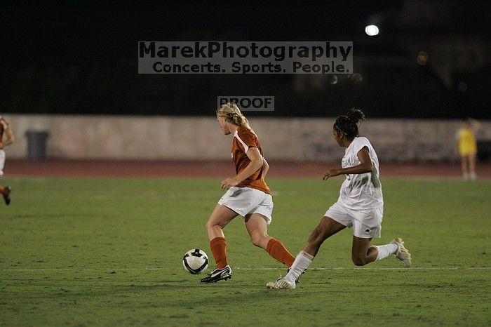 UT freshman Courtney Goodson (#7, Forward and Midfielder).  The University of Texas women's soccer team tied 0-0 against the Texas A&M Aggies Friday night, September 27, 2008.

Filename: SRM_20080926_2047440.jpg
Aperture: f/2.8
Shutter Speed: 1/500
Body: Canon EOS-1D Mark II
Lens: Canon EF 300mm f/2.8 L IS