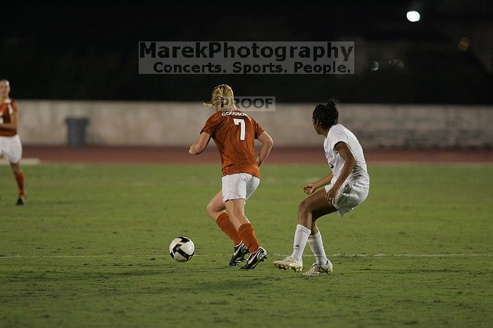 UT freshman Courtney Goodson (#7, Forward and Midfielder).  The University of Texas women's soccer team tied 0-0 against the Texas A&M Aggies Friday night, September 27, 2008.

Filename: SRM_20080926_2047441.jpg
Aperture: f/2.8
Shutter Speed: 1/500
Body: Canon EOS-1D Mark II
Lens: Canon EF 300mm f/2.8 L IS