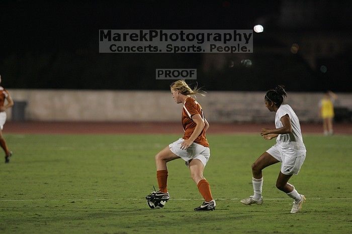 UT freshman Courtney Goodson (#7, Forward and Midfielder).  The University of Texas women's soccer team tied 0-0 against the Texas A&M Aggies Friday night, September 27, 2008.

Filename: SRM_20080926_2047449.jpg
Aperture: f/2.8
Shutter Speed: 1/500
Body: Canon EOS-1D Mark II
Lens: Canon EF 300mm f/2.8 L IS