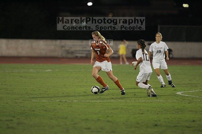 UT freshman Courtney Goodson (#7, Forward and Midfielder).  The University of Texas women's soccer team tied 0-0 against the Texas A&M Aggies Friday night, September 27, 2008.

Filename: SRM_20080926_2047485.jpg
Aperture: f/2.8
Shutter Speed: 1/500
Body: Canon EOS-1D Mark II
Lens: Canon EF 300mm f/2.8 L IS