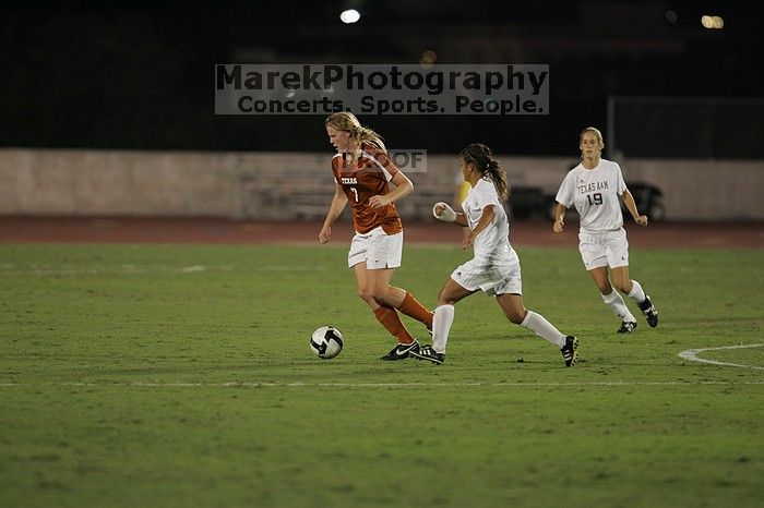 UT freshman Courtney Goodson (#7, Forward and Midfielder).  The University of Texas women's soccer team tied 0-0 against the Texas A&M Aggies Friday night, September 27, 2008.

Filename: SRM_20080926_2047486.jpg
Aperture: f/2.8
Shutter Speed: 1/500
Body: Canon EOS-1D Mark II
Lens: Canon EF 300mm f/2.8 L IS