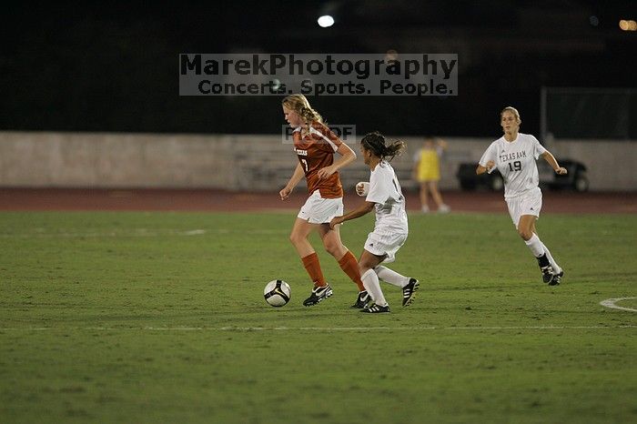 UT freshman Courtney Goodson (#7, Forward and Midfielder).  The University of Texas women's soccer team tied 0-0 against the Texas A&M Aggies Friday night, September 27, 2008.

Filename: SRM_20080926_2047487.jpg
Aperture: f/2.8
Shutter Speed: 1/500
Body: Canon EOS-1D Mark II
Lens: Canon EF 300mm f/2.8 L IS