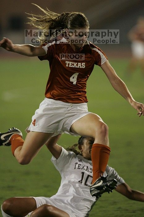 UT senior Jill Gilbeau (#4, Defender and Midfielder).  The University of Texas women's soccer team tied 0-0 against the Texas A&M Aggies Friday night, September 27, 2008.

Filename: SRM_20080926_2049082.jpg
Aperture: f/2.8
Shutter Speed: 1/500
Body: Canon EOS-1D Mark II
Lens: Canon EF 300mm f/2.8 L IS