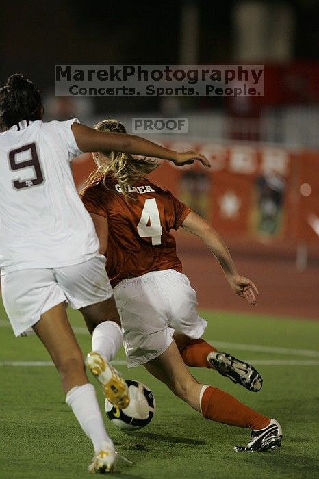 UT senior Jill Gilbeau (#4, Defender and Midfielder).  The University of Texas women's soccer team tied 0-0 against the Texas A&M Aggies Friday night, September 27, 2008.

Filename: SRM_20080926_2049125.jpg
Aperture: f/2.8
Shutter Speed: 1/500
Body: Canon EOS-1D Mark II
Lens: Canon EF 300mm f/2.8 L IS