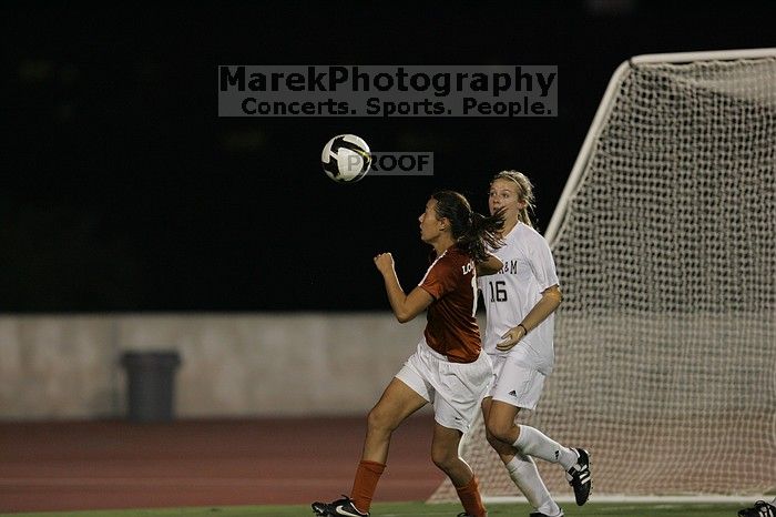 UT senior Stephanie Logterman (#10, Defender).  The University of Texas women's soccer team tied 0-0 against the Texas A&M Aggies Friday night, September 27, 2008.

Filename: SRM_20080926_2057585.jpg
Aperture: f/2.8
Shutter Speed: 1/640
Body: Canon EOS-1D Mark II
Lens: Canon EF 300mm f/2.8 L IS