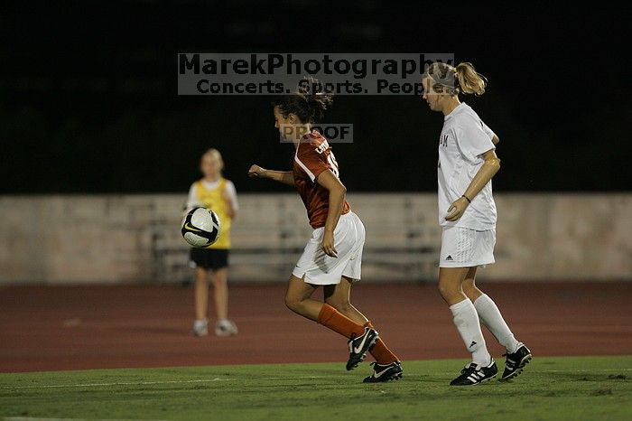 UT senior Stephanie Logterman (#10, Defender).  The University of Texas women's soccer team tied 0-0 against the Texas A&M Aggies Friday night, September 27, 2008.

Filename: SRM_20080926_2058000.jpg
Aperture: f/2.8
Shutter Speed: 1/640
Body: Canon EOS-1D Mark II
Lens: Canon EF 300mm f/2.8 L IS