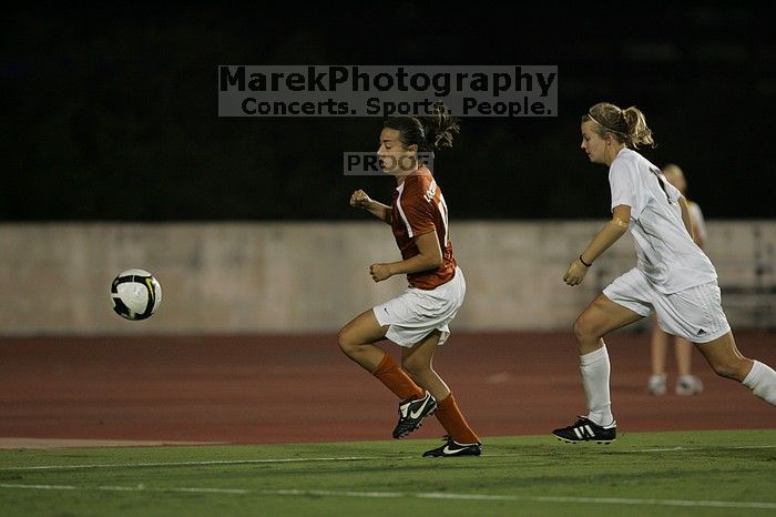 UT senior Stephanie Logterman (#10, Defender).  The University of Texas women's soccer team tied 0-0 against the Texas A&M Aggies Friday night, September 27, 2008.

Filename: SRM_20080926_2058002.jpg
Aperture: f/2.8
Shutter Speed: 1/640
Body: Canon EOS-1D Mark II
Lens: Canon EF 300mm f/2.8 L IS