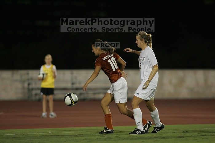 UT senior Stephanie Logterman (#10, Defender).  The University of Texas women's soccer team tied 0-0 against the Texas A&M Aggies Friday night, September 27, 2008.

Filename: SRM_20080926_2058009.jpg
Aperture: f/2.8
Shutter Speed: 1/640
Body: Canon EOS-1D Mark II
Lens: Canon EF 300mm f/2.8 L IS