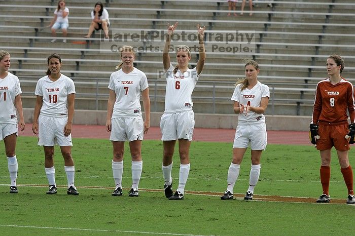 UT freshman Lucy Keith (#6, Midfielder) greets the crowd.  The University of Texas women's soccer team won 2-1 against the Iowa State Cyclones Sunday afternoon, October 5, 2008.

Filename: SRM_20081005_11530243.jpg
Aperture: f/8.0
Shutter Speed: 1/1000
Body: Canon EOS-1D Mark II
Lens: Canon EF 300mm f/2.8 L IS