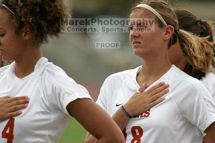 UT freshman Samantha Toner (#18, Midfielder) listens to the national anthem before the start of the game.  The University of Texas women's soccer team won 2-1 against the Iowa State Cyclones Sunday afternoon, October 5, 2008.

Filename: SRM_20081005_11550852.jpg
Aperture: f/8.0
Shutter Speed: 1/1000
Body: Canon EOS-1D Mark II
Lens: Canon EF 300mm f/2.8 L IS