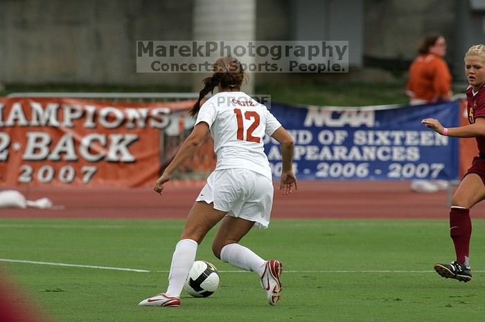 UT sophomore Alisha Ortiz (#12, Forward).  The University of Texas women's soccer team won 2-1 against the Iowa State Cyclones Sunday afternoon, October 5, 2008.

Filename: SRM_20081005_11594695.jpg
Aperture: f/8.0
Shutter Speed: 1/1000
Body: Canon EOS-1D Mark II
Lens: Canon EF 300mm f/2.8 L IS