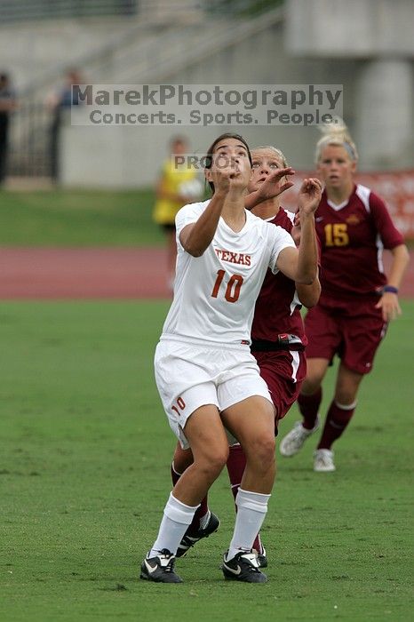 UT senior Stephanie Logterman (#10, Defender) awaits a header.  The University of Texas women's soccer team won 2-1 against the Iowa State Cyclones Sunday afternoon, October 5, 2008.

Filename: SRM_20081005_12025415.jpg
Aperture: f/5.6
Shutter Speed: 1/2000
Body: Canon EOS-1D Mark II
Lens: Canon EF 300mm f/2.8 L IS