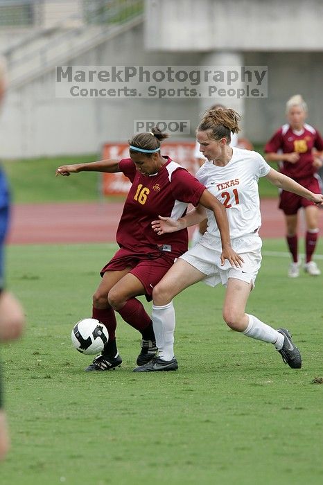 UT junior Emily Anderson (#21, Forward) stabs at the ball.  The University of Texas women's soccer team won 2-1 against the Iowa State Cyclones Sunday afternoon, October 5, 2008.

Filename: SRM_20081005_12051648.jpg
Aperture: f/5.6
Shutter Speed: 1/1250
Body: Canon EOS-1D Mark II
Lens: Canon EF 300mm f/2.8 L IS