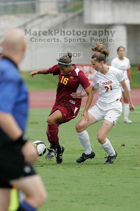 UT junior Emily Anderson (#21, Forward) stabs at the ball.  The University of Texas women's soccer team won 2-1 against the Iowa State Cyclones Sunday afternoon, October 5, 2008.

Filename: SRM_20081005_12051649.jpg
Aperture: f/5.6
Shutter Speed: 1/1000
Body: Canon EOS-1D Mark II
Lens: Canon EF 300mm f/2.8 L IS