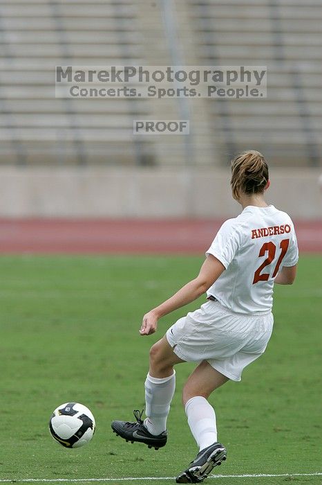 UT junior Emily Anderson (#21, Forward) passes the ball.  The University of Texas women's soccer team won 2-1 against the Iowa State Cyclones Sunday afternoon, October 5, 2008.

Filename: SRM_20081005_12054477.jpg
Aperture: f/5.6
Shutter Speed: 1/1600
Body: Canon EOS-1D Mark II
Lens: Canon EF 300mm f/2.8 L IS