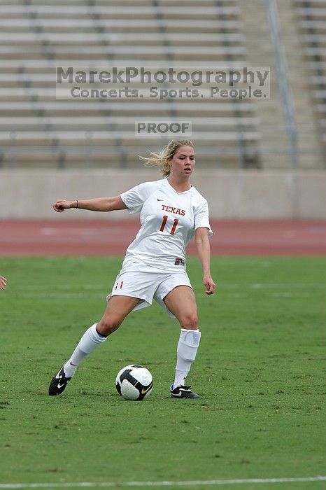 UT sophomore Niki Arlitt (#11, Forward).  The University of Texas women's soccer team won 2-1 against the Iowa State Cyclones Sunday afternoon, October 5, 2008.

Filename: SRM_20081005_12054678.jpg
Aperture: f/5.6
Shutter Speed: 1/1600
Body: Canon EOS-1D Mark II
Lens: Canon EF 300mm f/2.8 L IS