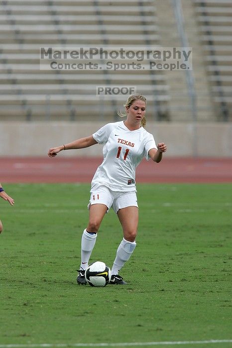 UT sophomore Niki Arlitt (#11, Forward).  The University of Texas women's soccer team won 2-1 against the Iowa State Cyclones Sunday afternoon, October 5, 2008.

Filename: SRM_20081005_12054679.jpg
Aperture: f/5.6
Shutter Speed: 1/1600
Body: Canon EOS-1D Mark II
Lens: Canon EF 300mm f/2.8 L IS