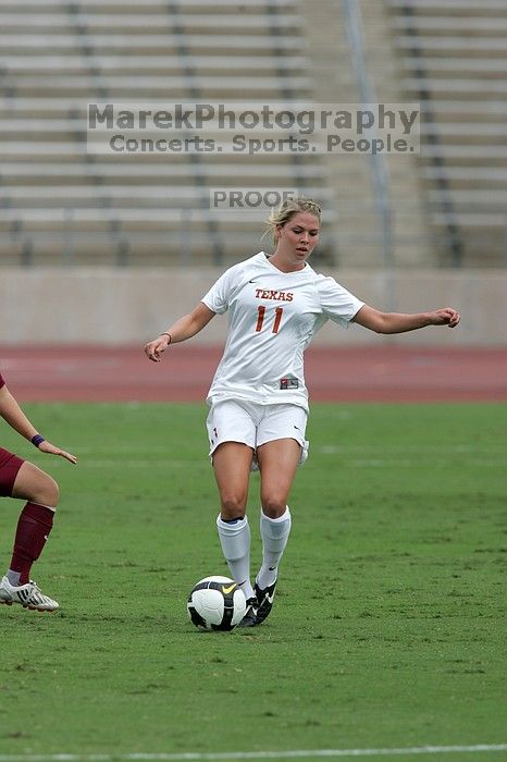 UT sophomore Niki Arlitt (#11, Forward).  The University of Texas women's soccer team won 2-1 against the Iowa State Cyclones Sunday afternoon, October 5, 2008.

Filename: SRM_20081005_12054680.jpg
Aperture: f/5.6
Shutter Speed: 1/2000
Body: Canon EOS-1D Mark II
Lens: Canon EF 300mm f/2.8 L IS