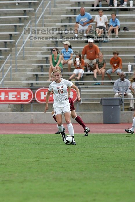 UT freshman Kylie Doniak (#15, Midfielder).  The University of Texas women's soccer team won 2-1 against the Iowa State Cyclones Sunday afternoon, October 5, 2008.

Filename: SRM_20081005_12064283.jpg
Aperture: f/5.6
Shutter Speed: 1/1600
Body: Canon EOS-1D Mark II
Lens: Canon EF 300mm f/2.8 L IS