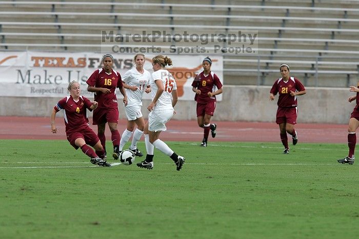 UT freshman Kylie Doniak (#15, Midfielder).  The University of Texas women's soccer team won 2-1 against the Iowa State Cyclones Sunday afternoon, October 5, 2008.

Filename: SRM_20081005_12073602.jpg
Aperture: f/5.6
Shutter Speed: 1/1600
Body: Canon EOS-1D Mark II
Lens: Canon EF 300mm f/2.8 L IS