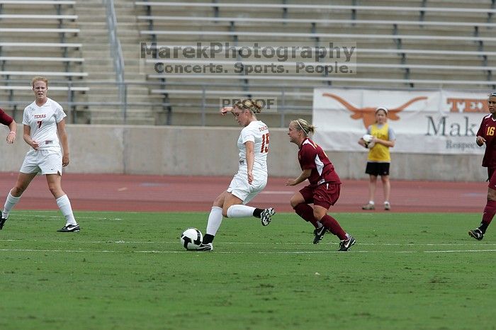 UT freshman Kylie Doniak (#15, Midfielder).  The University of Texas women's soccer team won 2-1 against the Iowa State Cyclones Sunday afternoon, October 5, 2008.

Filename: SRM_20081005_12073806.jpg
Aperture: f/5.6
Shutter Speed: 1/2000
Body: Canon EOS-1D Mark II
Lens: Canon EF 300mm f/2.8 L IS