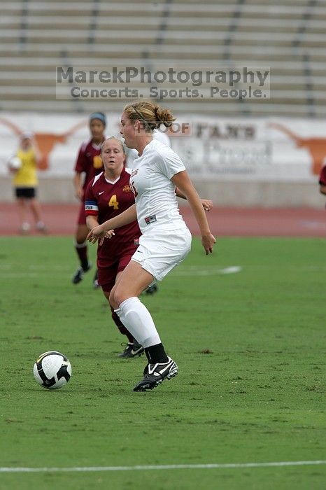 UT freshman Kylie Doniak (#15, Midfielder).  The University of Texas women's soccer team won 2-1 against the Iowa State Cyclones Sunday afternoon, October 5, 2008.

Filename: SRM_20081005_12074811.jpg
Aperture: f/5.6
Shutter Speed: 1/2000
Body: Canon EOS-1D Mark II
Lens: Canon EF 300mm f/2.8 L IS