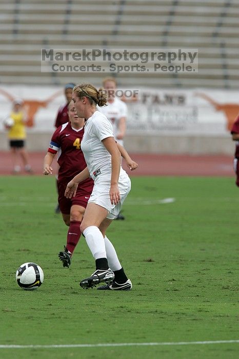 UT freshman Kylie Doniak (#15, Midfielder).  The University of Texas women's soccer team won 2-1 against the Iowa State Cyclones Sunday afternoon, October 5, 2008.

Filename: SRM_20081005_12074812.jpg
Aperture: f/5.6
Shutter Speed: 1/2000
Body: Canon EOS-1D Mark II
Lens: Canon EF 300mm f/2.8 L IS