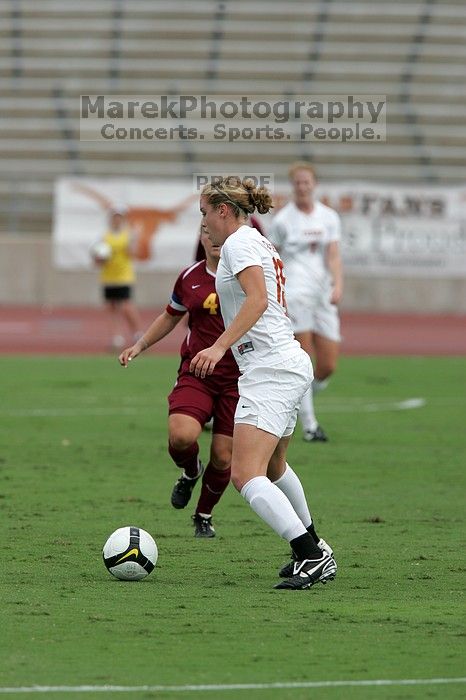 UT freshman Kylie Doniak (#15, Midfielder).  The University of Texas women's soccer team won 2-1 against the Iowa State Cyclones Sunday afternoon, October 5, 2008.

Filename: SRM_20081005_12074813.jpg
Aperture: f/5.6
Shutter Speed: 1/2000
Body: Canon EOS-1D Mark II
Lens: Canon EF 300mm f/2.8 L IS