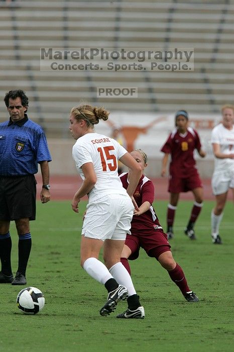 UT freshman Kylie Doniak (#15, Midfielder).  The University of Texas women's soccer team won 2-1 against the Iowa State Cyclones Sunday afternoon, October 5, 2008.

Filename: SRM_20081005_12074814.jpg
Aperture: f/5.6
Shutter Speed: 1/2000
Body: Canon EOS-1D Mark II
Lens: Canon EF 300mm f/2.8 L IS